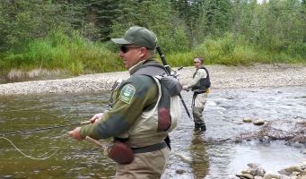 AEP biologists perform a creel survey for Arctic Grayling